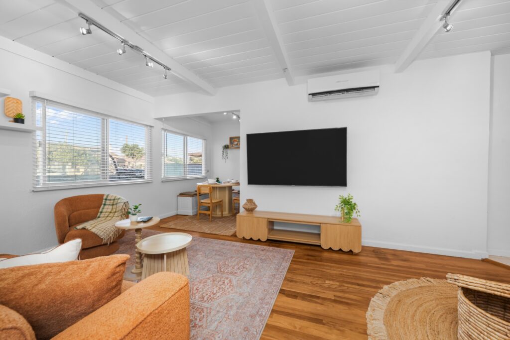 Casa Brisa bright living room with sofa and smart TV