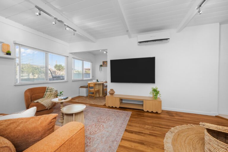 Casa Brisa living room with smart TV and dining area