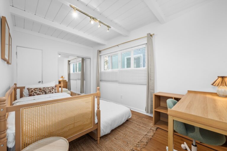 Casa Brisa bedroom with wood bed frame