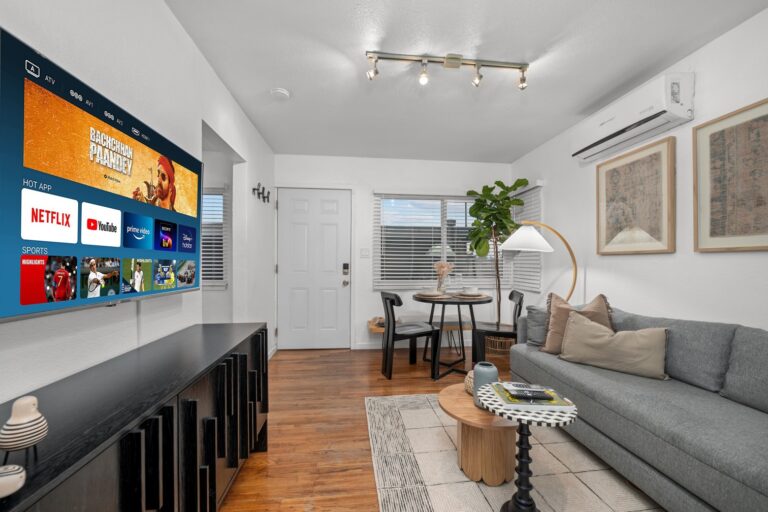 Casa Brisa living room with smart TV and dining area