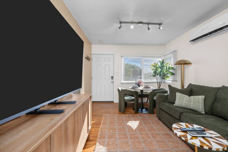 Casa Sol open living area with 75-inch TV and sofa