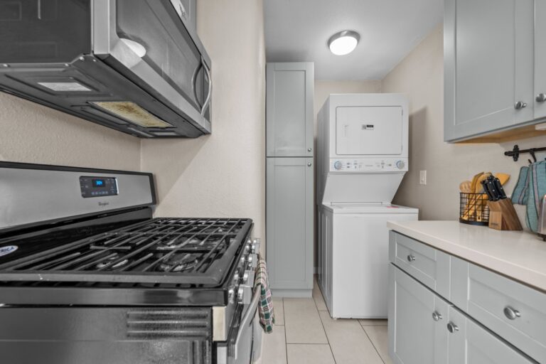 Casa Sol kitchen with 5-burner gas range and washer and dryer
