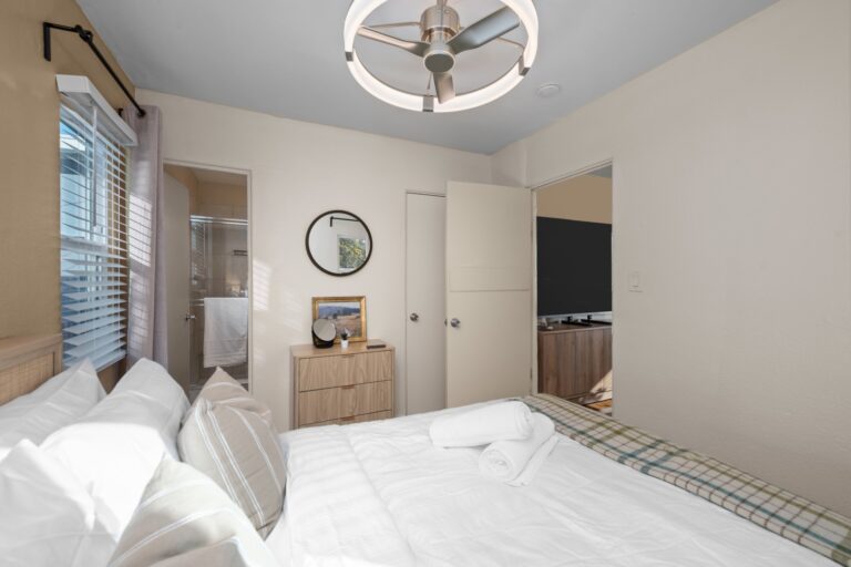 Casa Sol bedroom with queen bed and ceiling fan